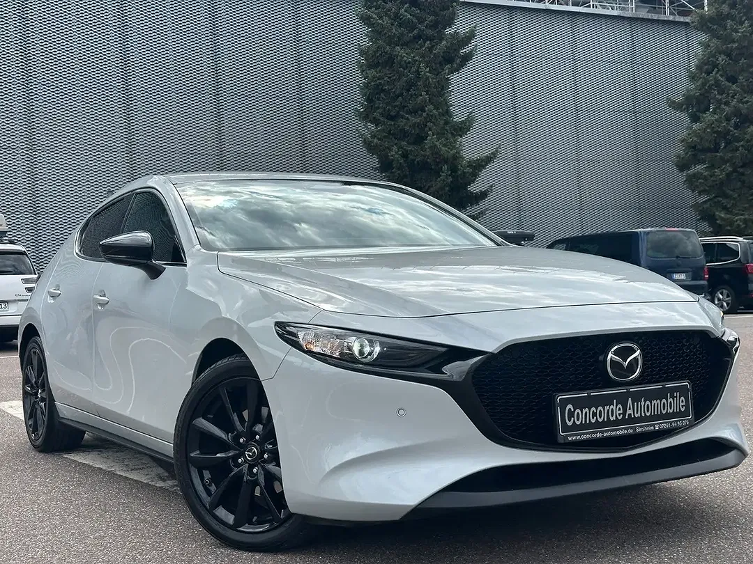 Mazda 3 - foto 1
