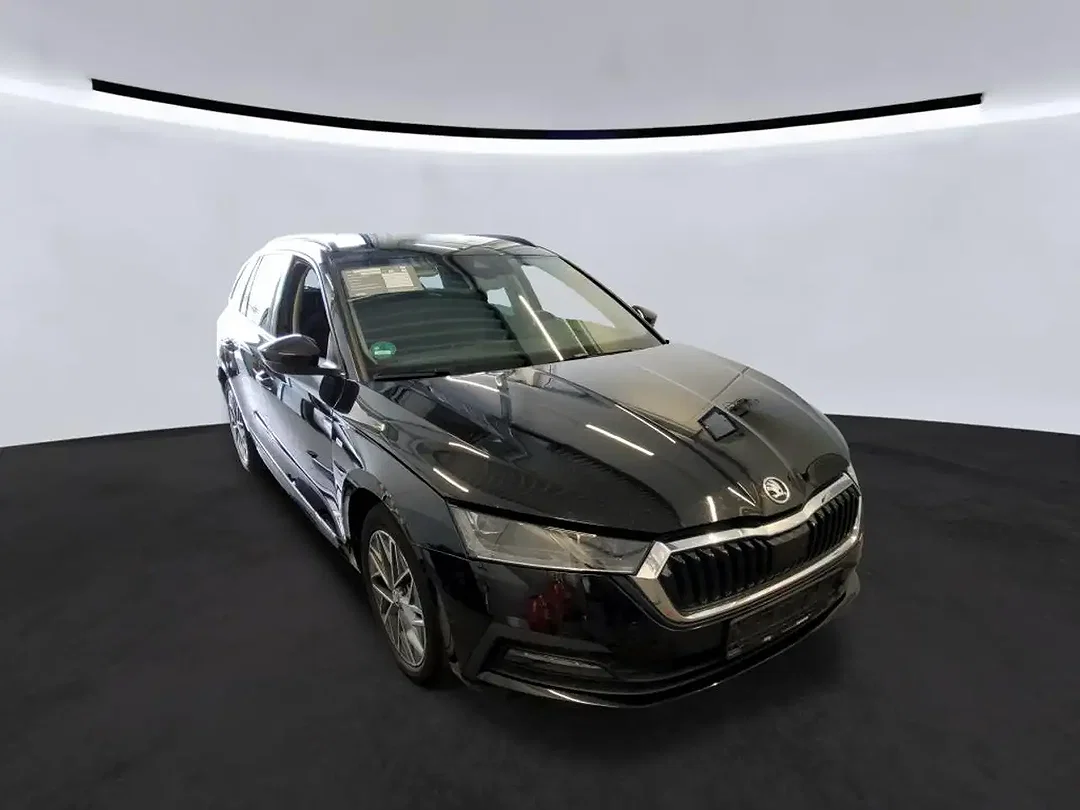 Skoda Octavia 2.0 TDI DSG Combi Tour - Afbeelding 1