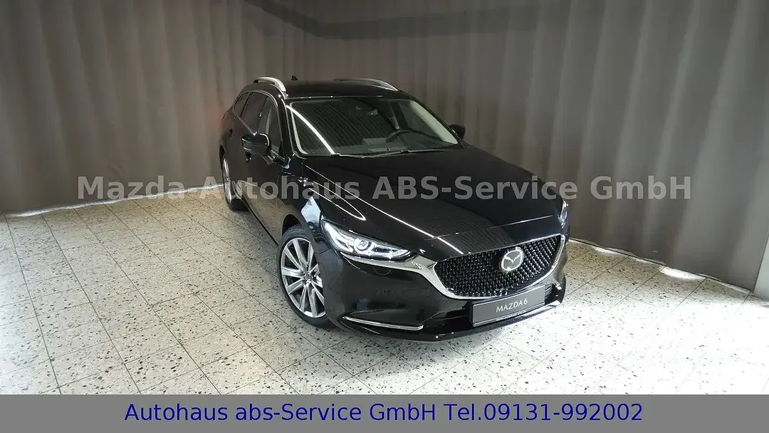 Mazda 6 2.0 - foto 1